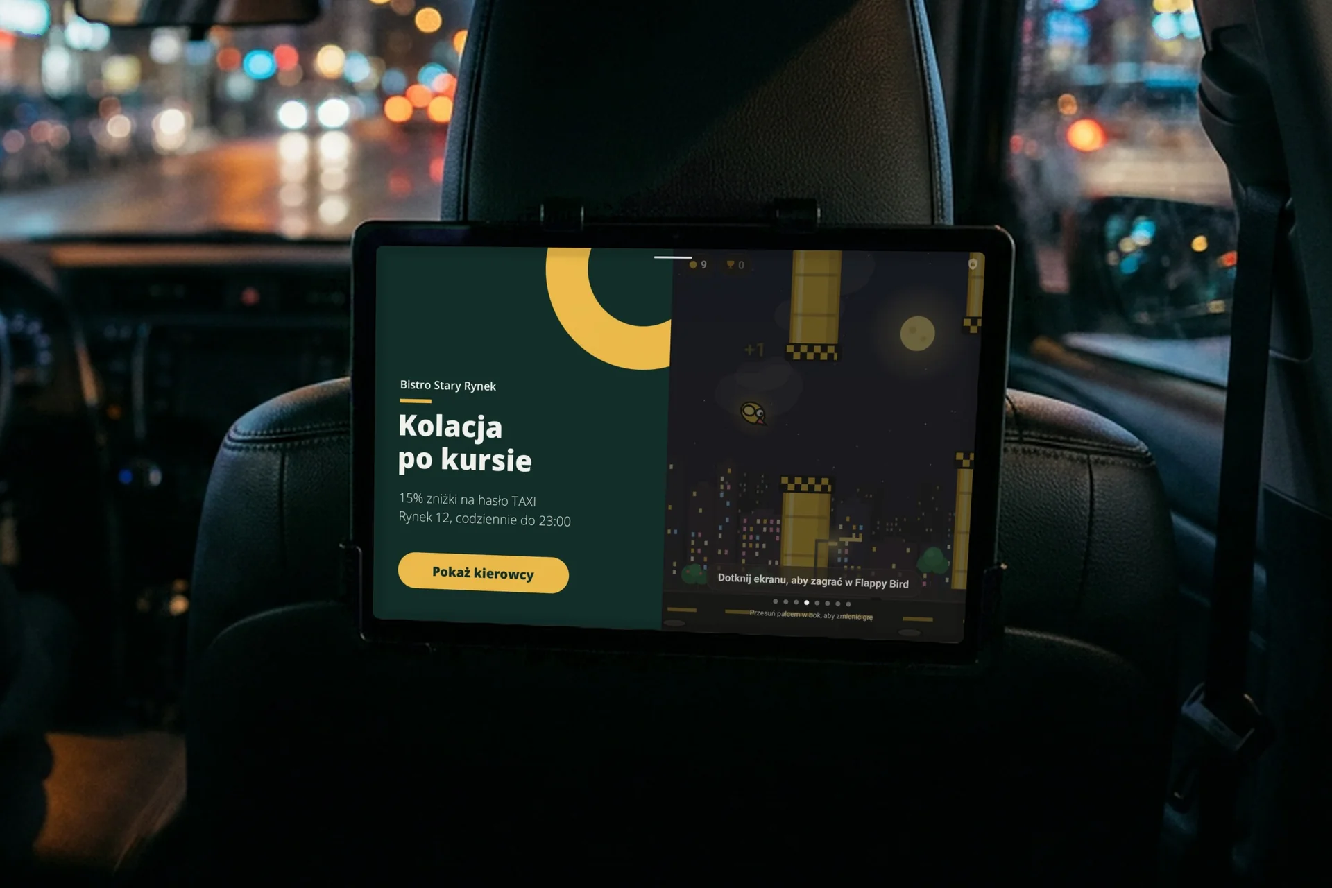 Tablet za zagłówkiem w nocy: ciemny motyw aplikacji